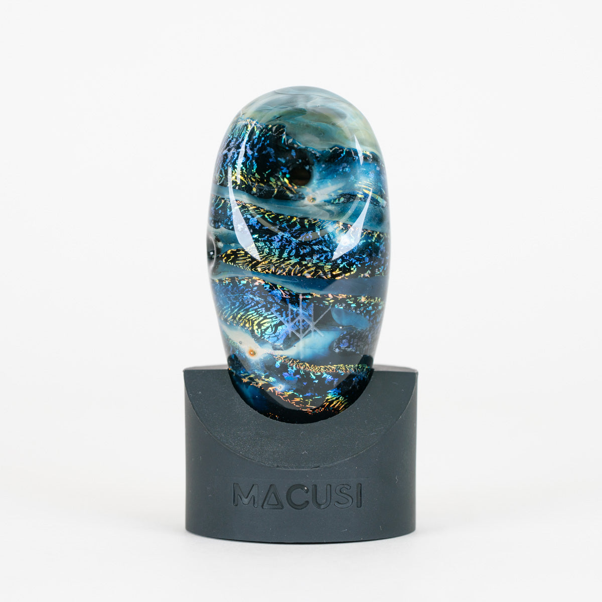 Macusi Cosmos blue glass pipe on black stand with white background