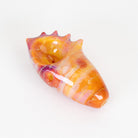 Macusi orange and purple seashell glass pipe on white background