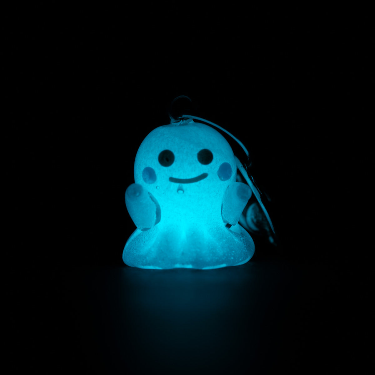 Glow in the Dark cute Blushy Ghost charm by Mmmelty on black background 