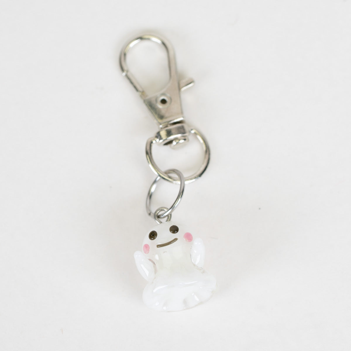 Mmmelty Blushy Ghost glass Puffco charm with white body and pink cheeks