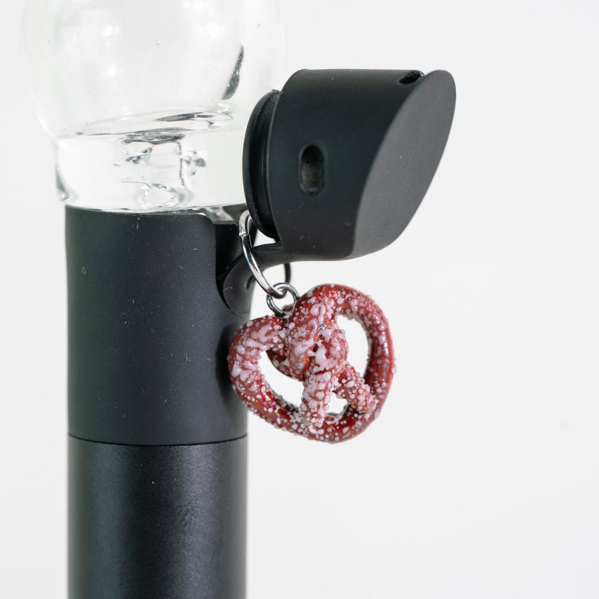 Pretzel glass Puffco charm with a playful snack-inspired design