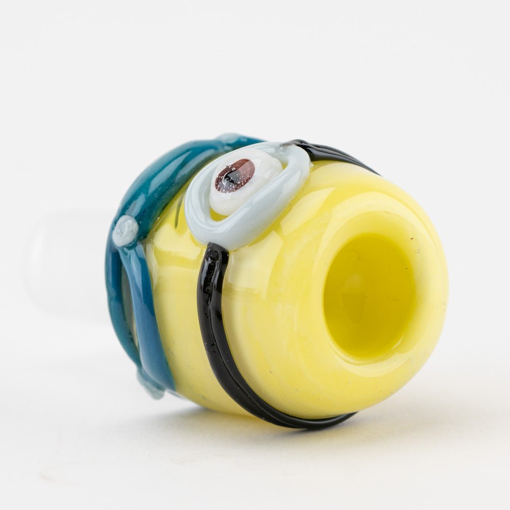 One Eyed Monster glass bowl piece with blue accents and goggle-style glasswork
