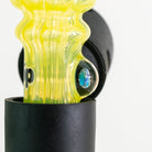 Encased opal marble detail on yellow glass plume