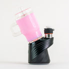 Pink tumbler Puffco Peak glass attachment by Empire Glassworks on a Puffco device