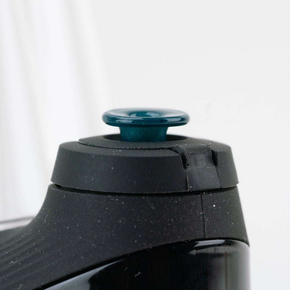 Blue glass joystick cap shown for a Puffco New Peak setup