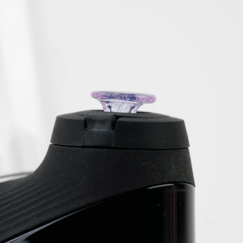 Pink Slyme joystick cap displayed with a Puffco New Peak device