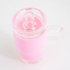 Pink tumbler-style Puffco Peak glass attachment shown from the top