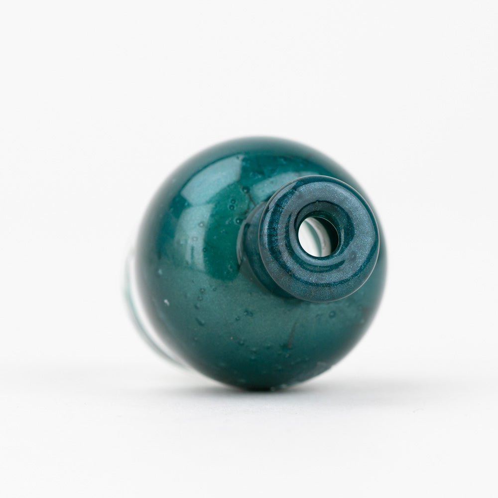 Closeup of the Blue Lagoon glass mouthpiece for Puffco Pivot