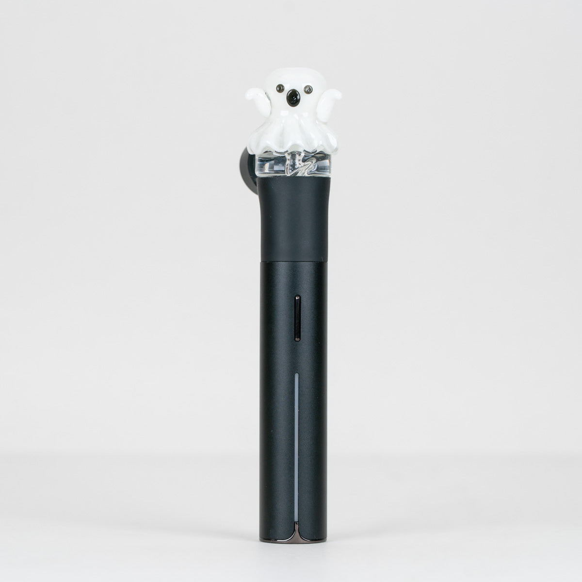 Spooky Ghost glass mouthpiece installed on a black Puffco Pivot