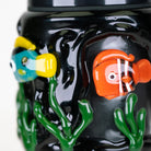 Close-up of the orange clownfish on the Save the Seas glass attachment
