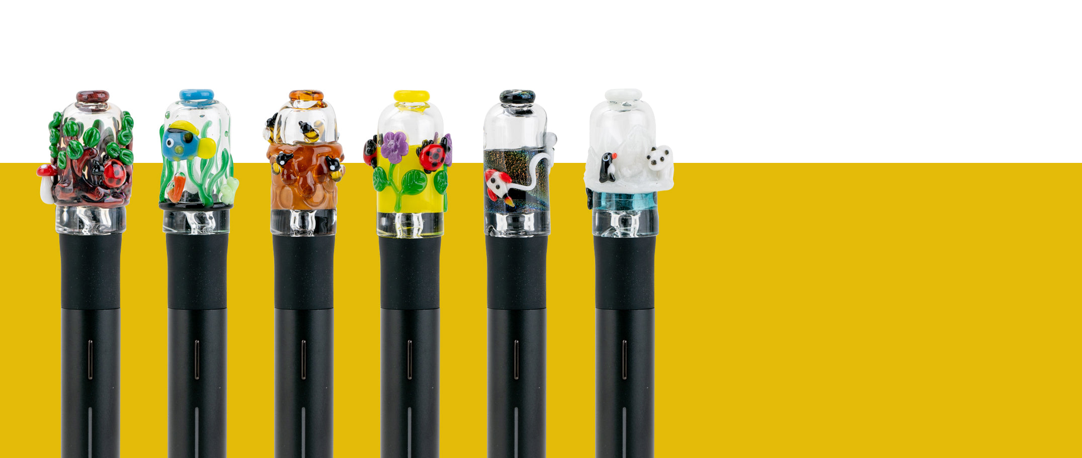 An assortment of six figurine designed glass attachments for the Puffco Pivot, each attached to a device