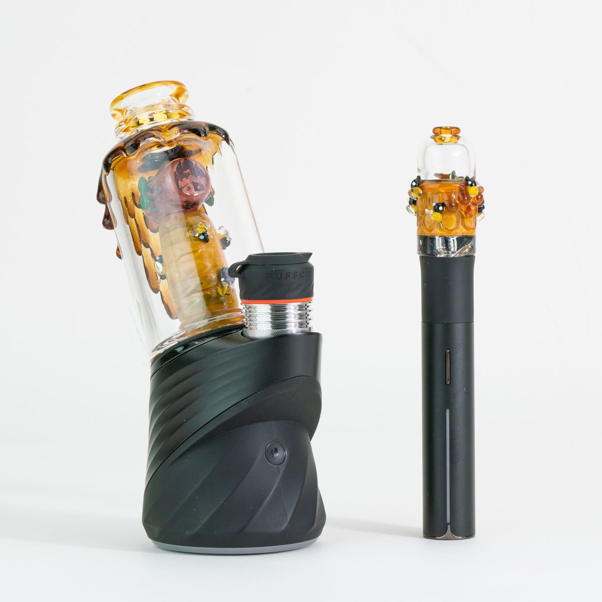 Save the Bees Puffco Peak glass attachment and matching Pivot mouthpiece displayed on Puffco device