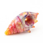 Top view of the sculpted seashell glass bowl piece and its spiral ridges