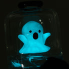 Glowing blue ghost figure inside a dry top peak attachment for the Puffco Peak Pro