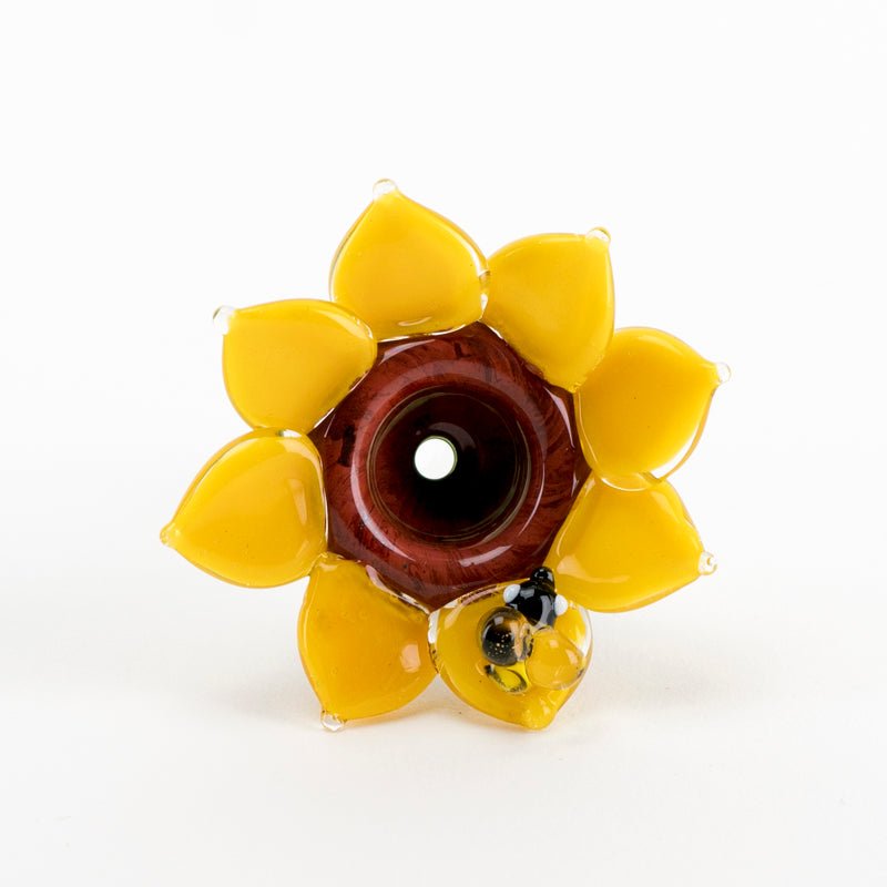 Decorative item resembling a sunflower with a brown center on a white background