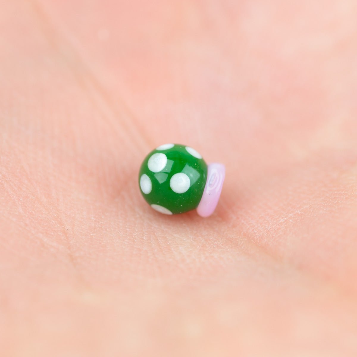Handcrafted 4mm terp pearl Peyote Cactus on person's palm