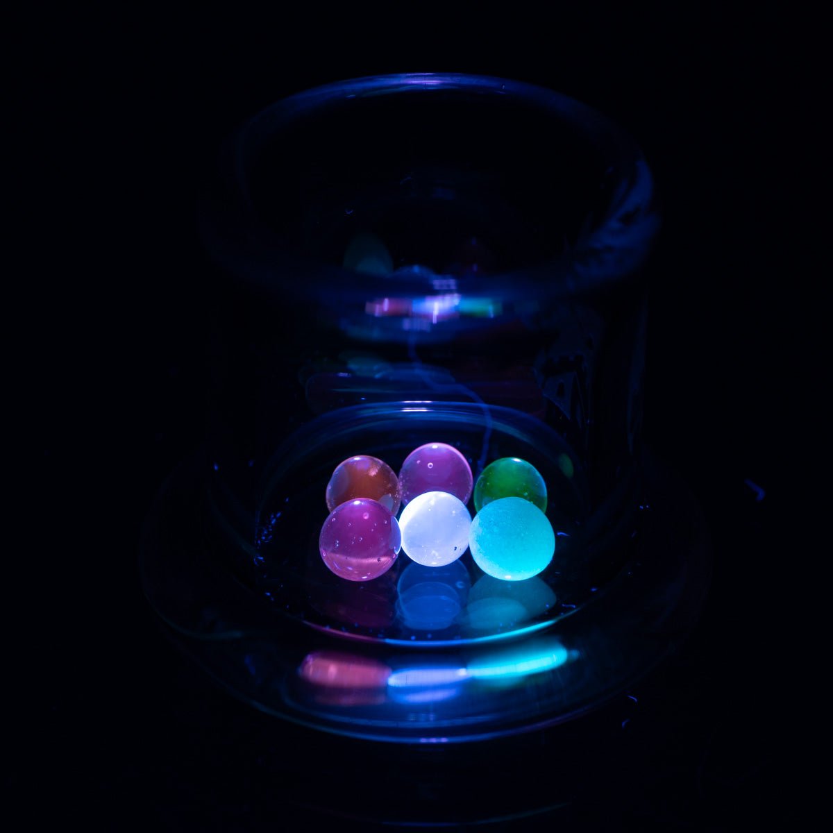 UV and glow terp pearl set with pink, orange, green, blue, peach, and white pearls