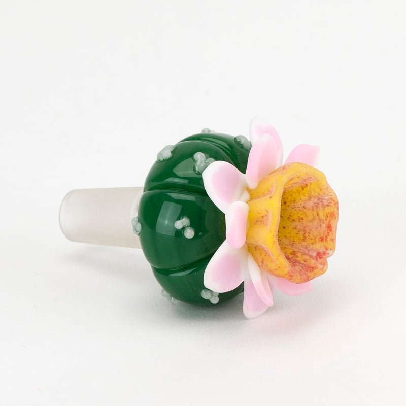 Front view of the UV Peyote glass bowl with a yellow-orange flower center