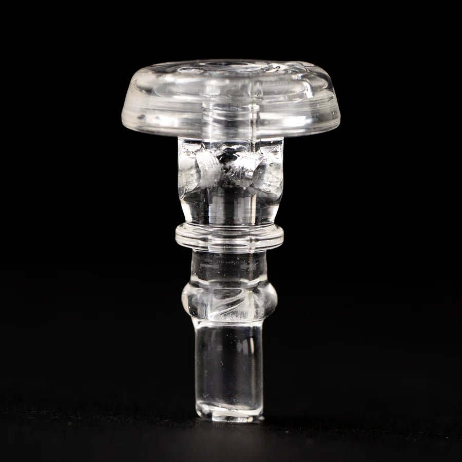 UV-reactive Puffco Peak Pro 3DXL glass joystick glowing pink under UV light