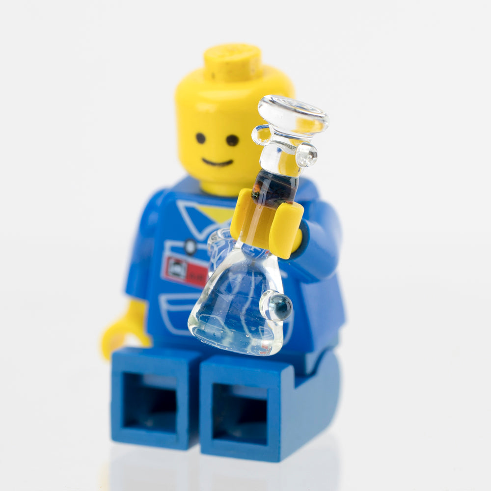 Heady lego bong set with lego figurine holding the lego bong