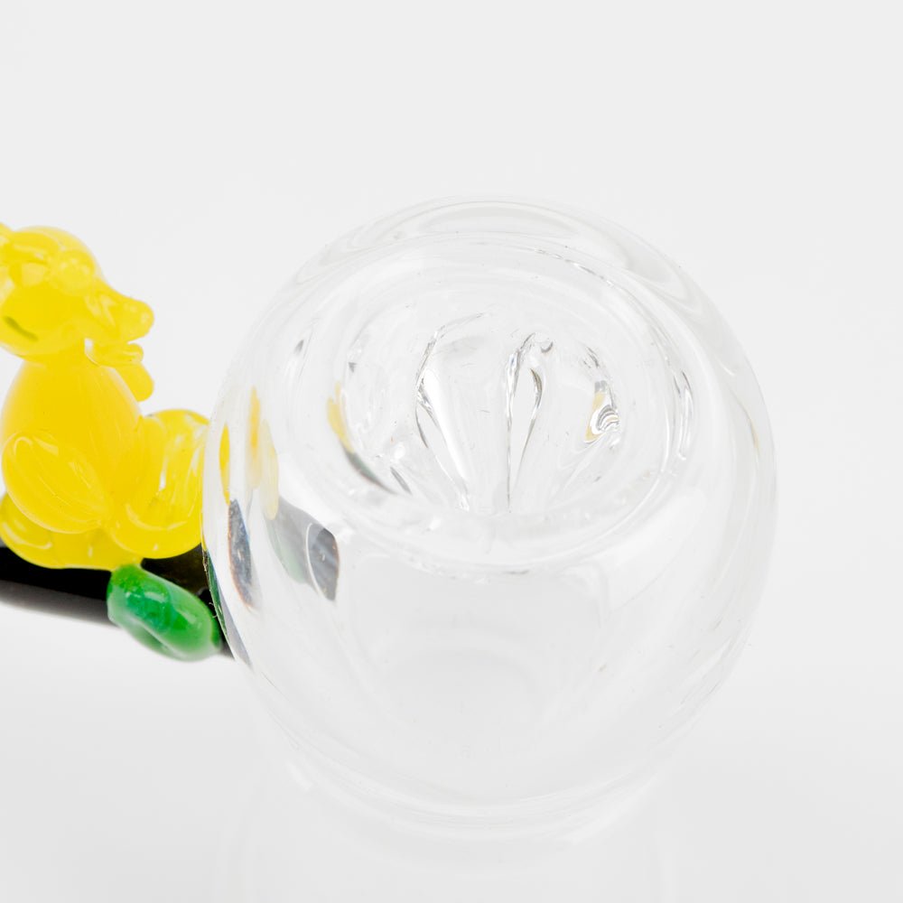 Yellow bird glass bowl piece with clear body and colorful side accent
